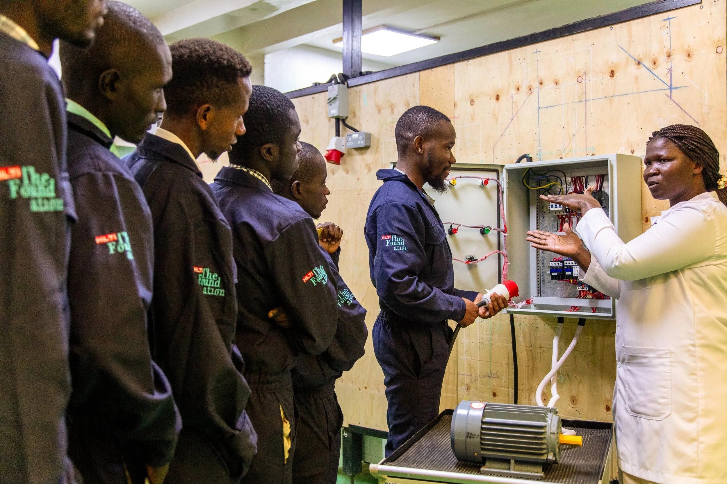 Young Kenyan trainees gain practical experience in a vocational workshop as part of a dual-training approach linking education with industry.