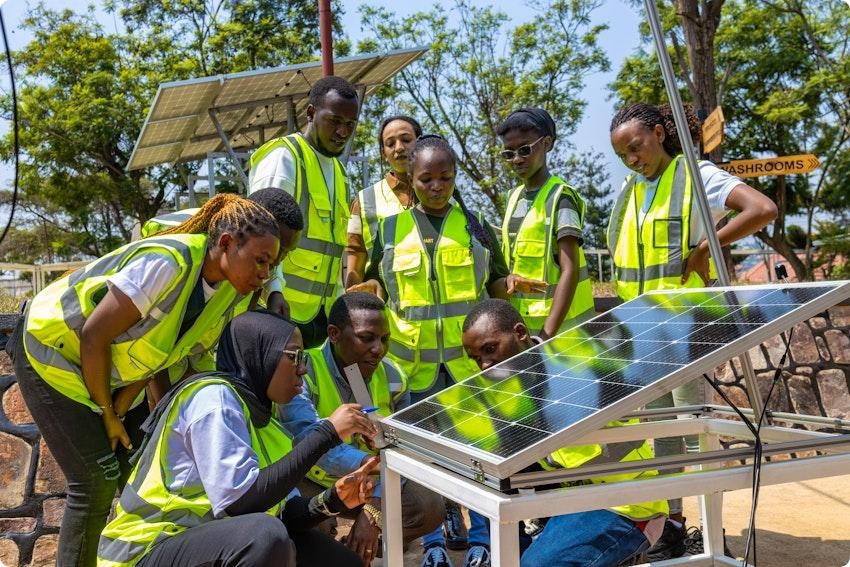 Trainees in Rwanda participate in hands-on solar technology training, reflecting the growing importance of technical skills in Africa's green economy.