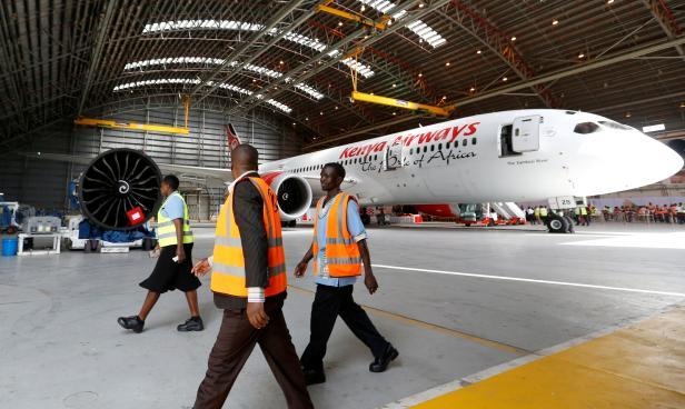 A Kenya Airways plane is serviced at Jomo Kenyatta International Airport in Nairobi on August 25, 2026. Maintenance delays and spare-parts shortages have reduced the airline's available aircraft, limiting its ability to take full advantage of passenger demand.