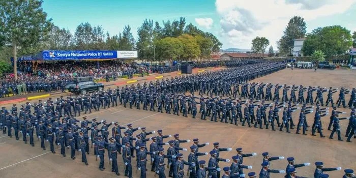 Newly graduated police constables march during the passing-out parade at Kiganjo after completing nine months of training. /PCS