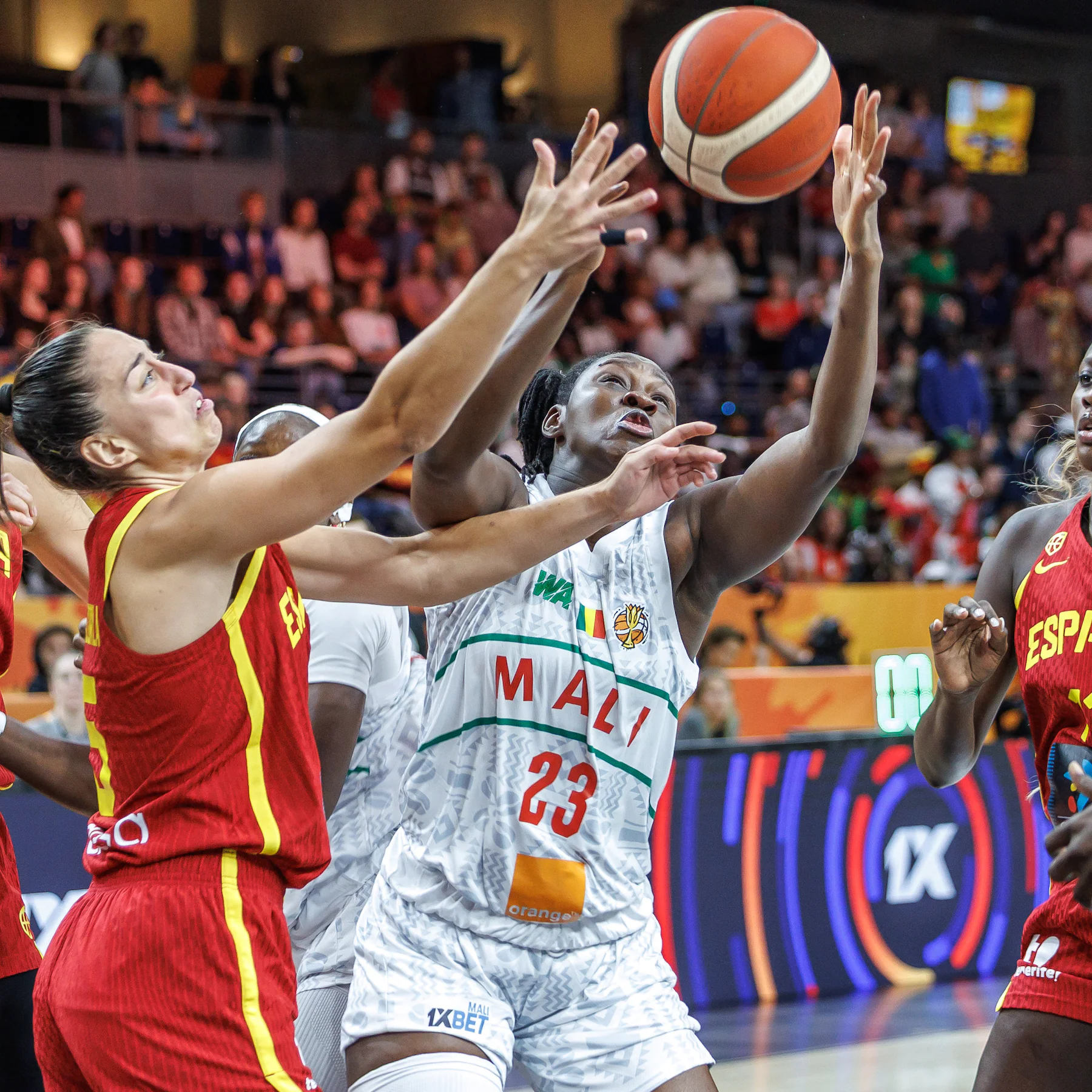 Mali’s Sika Kone vies for the ball with Spain’s Maite Cazorla, left, during the women’s World Cup basketball match between Mali and Spain, in Berlin, Saturday, Sept. 5, 2026. (Andreas Gora/dpa via AP)