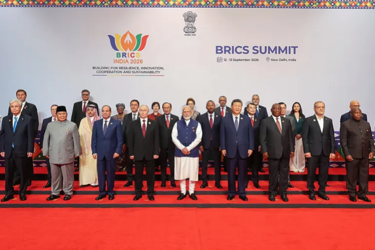 Leaders of participating countries gather for a family photo during the 18th BRICS Summit in New Delhi on September 13, 2026 [Handout/Indian Press Information Bureau (PIB) via AFP]