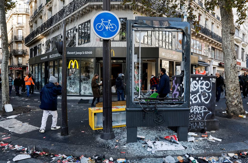 People in France woke up on Monday to streets littered with shattered glass and images of burned-out government buildings after the country’s largest protests in years descended into violent riots.